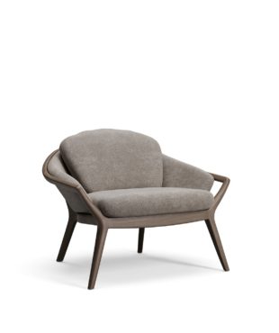 Discover the Abbraccio armchair, a luxury made-to-order design combining sculptural elegance and exceptional comfort. Shop at Harmony.