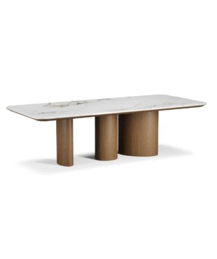 Discover the Yott dining table by Harmony, a luxury designer dining table defined by its sculptural rhythm and refined material composition. Its elongated silhouette is supported by a sequence of cylindrical wooden bases, creating a sense of balance, movement, and architectural elegance in sophisticated dining spaces. Harmony crafts this made-to-order piece with a solid wood structure, showcasing the richness and natural grain of the material. The tabletop, finished in a smooth and elegant surface, introduces a refined contrast that enhances both durability and visual lightness. This thoughtful combination delivers stability, longevity, and a distinctive aesthetic presence. Perfect for elevated dining environments, the Yott dining table blends craftsmanship, premium materials, and contemporary design, making it a standout centerpiece for curated interiors. Explore complementary finishes, materials, and designs in the Harmony catalogs.