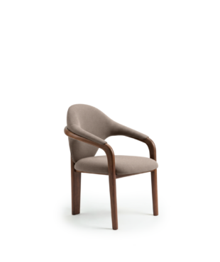 The Luna dining chair, part of the Presence Collection, explizies the fluid relationship between form and materiality through a sculptural yet inviting design. Its continuous wooden structure embraces the upholstered seat in a gesture that feels both organic and refined, creating a silhouette defined by softness, movement, and balance. Elegant from every angle, Luna brings a distinctive presence to contemporary interiors while maintaining a natural sense of comfort and sophistication.