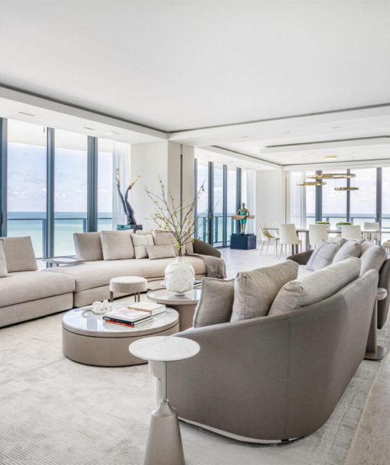 Modern luxury meets ocean views in a sophisticated, airy setting, defined by neutral tones, clean lines, and contemporary design. Regalia Residences is a project by FL Interiors, featuring Harmony Luxury Furniture.