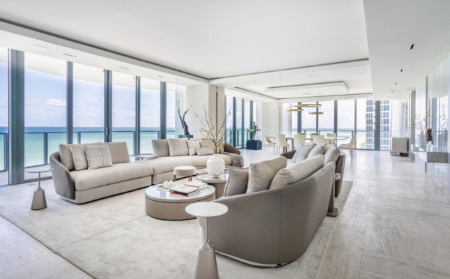 Modern luxury meets ocean views in a sophisticated, airy setting, defined by neutral tones, clean lines, and contemporary design. Regalia Residences is a project by FL Interiors, featuring Harmony Luxury Furniture.