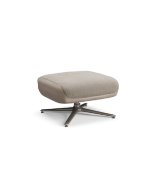 Upholstered ottoman with a square cushion and a metal four-star base, shown from a slight angle.