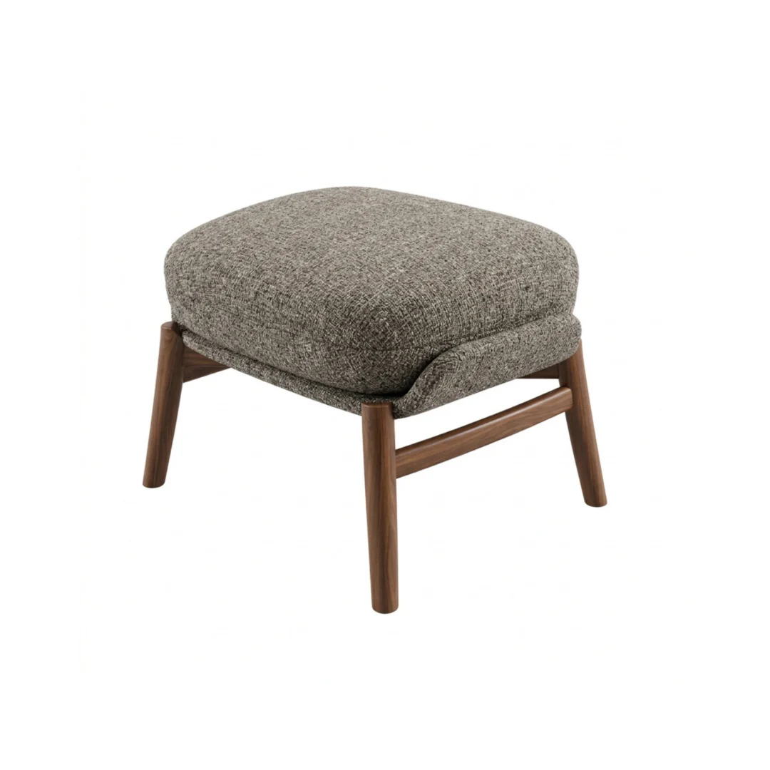 Harmony luxury furniture ottoman with rounded cushioned top and angled base, shown from a front angle.